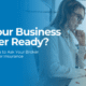 Small business owner using a laptop at her boutique counter, with the text “Is Your Business Cyber Ready?”